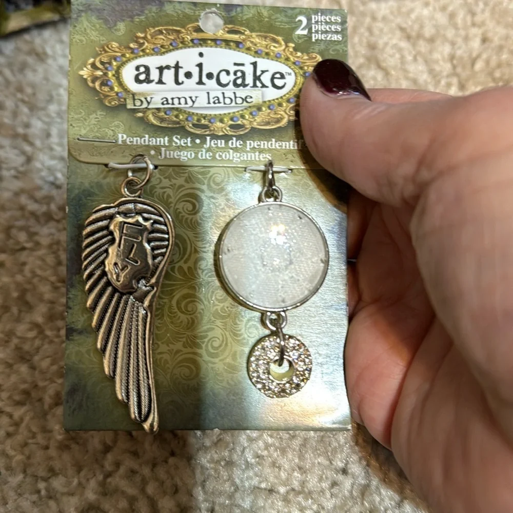 COPY - art i cake amy labbe wing (fly) and lace, pendant